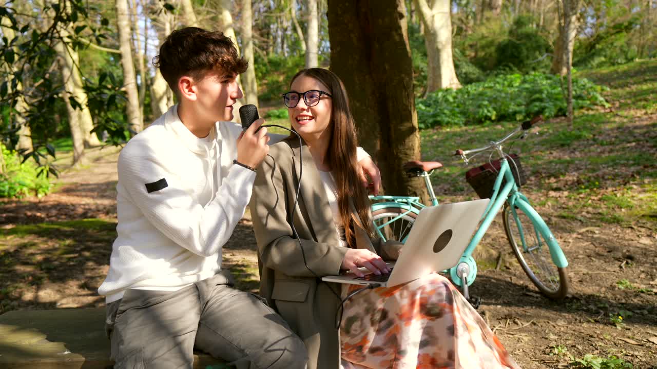 Young Couple Podcasting in the Park