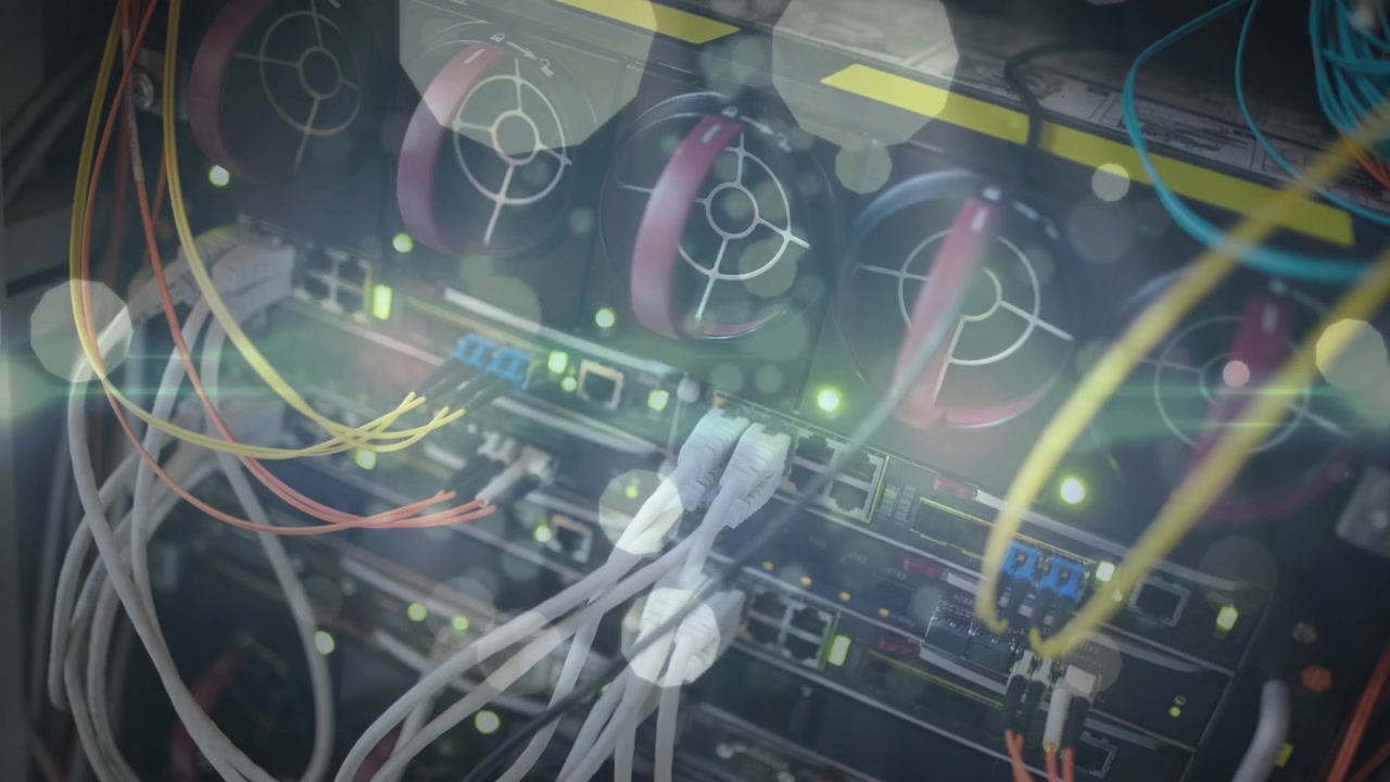 Animation of lights and dots floating over computer wires