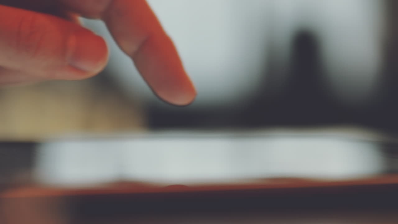 Close up hands touching tablet computer