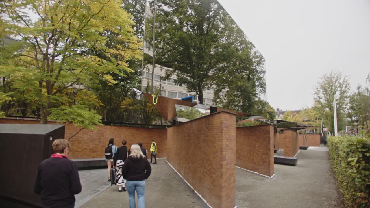 A Modern Memorial: Reflective Walls and Tranquil Pathways