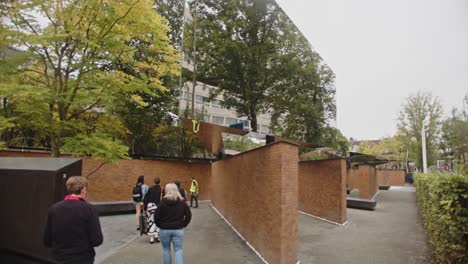 a modern memorial: reflective walls and tranquil pathways