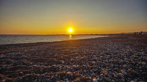 Pebble-Shore-Of-Paphos-Beach-During-Sunset-In-Southwest-Cyprus