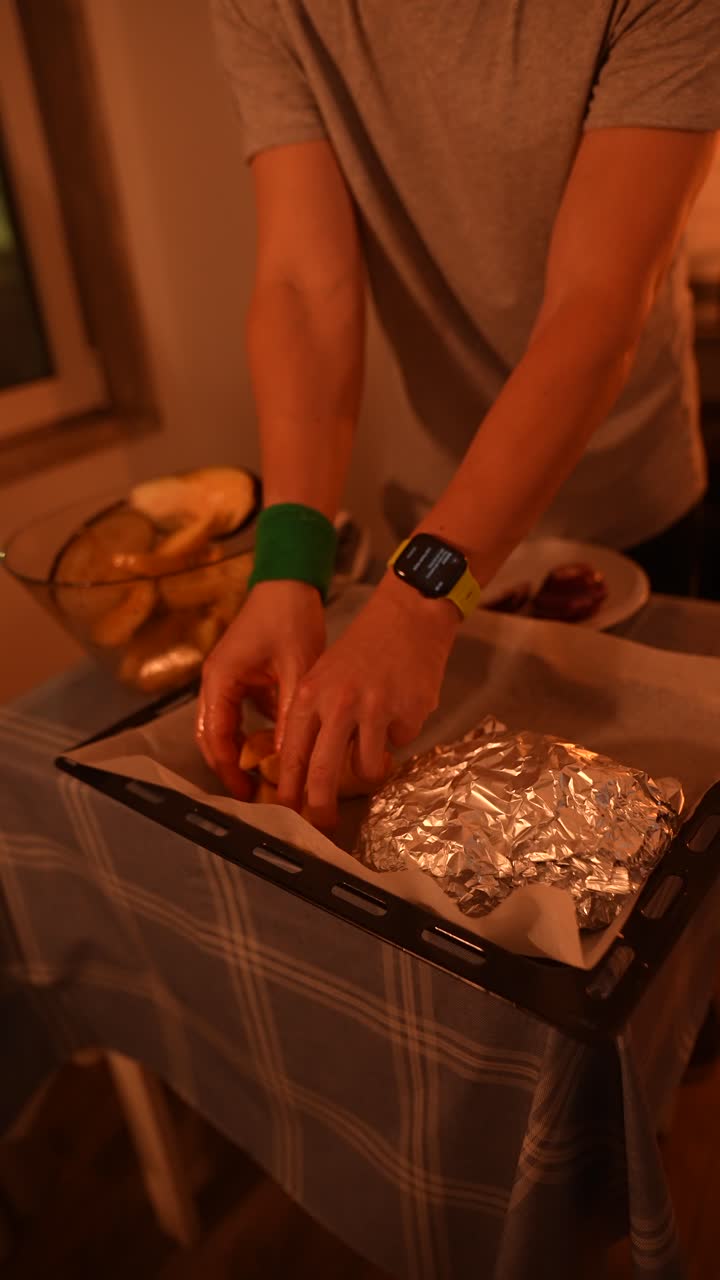 Preparing a Baked Dish with Potatoes and Vegetables