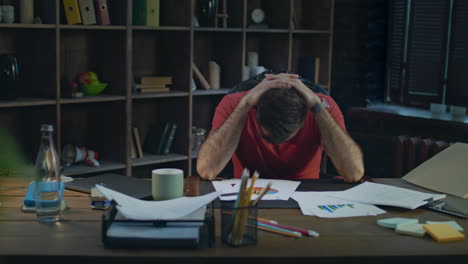 upset business man putting hands on head. depressed man thinking about business