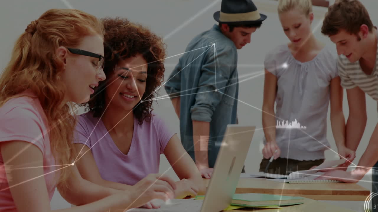 Collaborating on laptops, diverse group in school with digital animation overlay