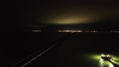 a dark bridge crossing in the night