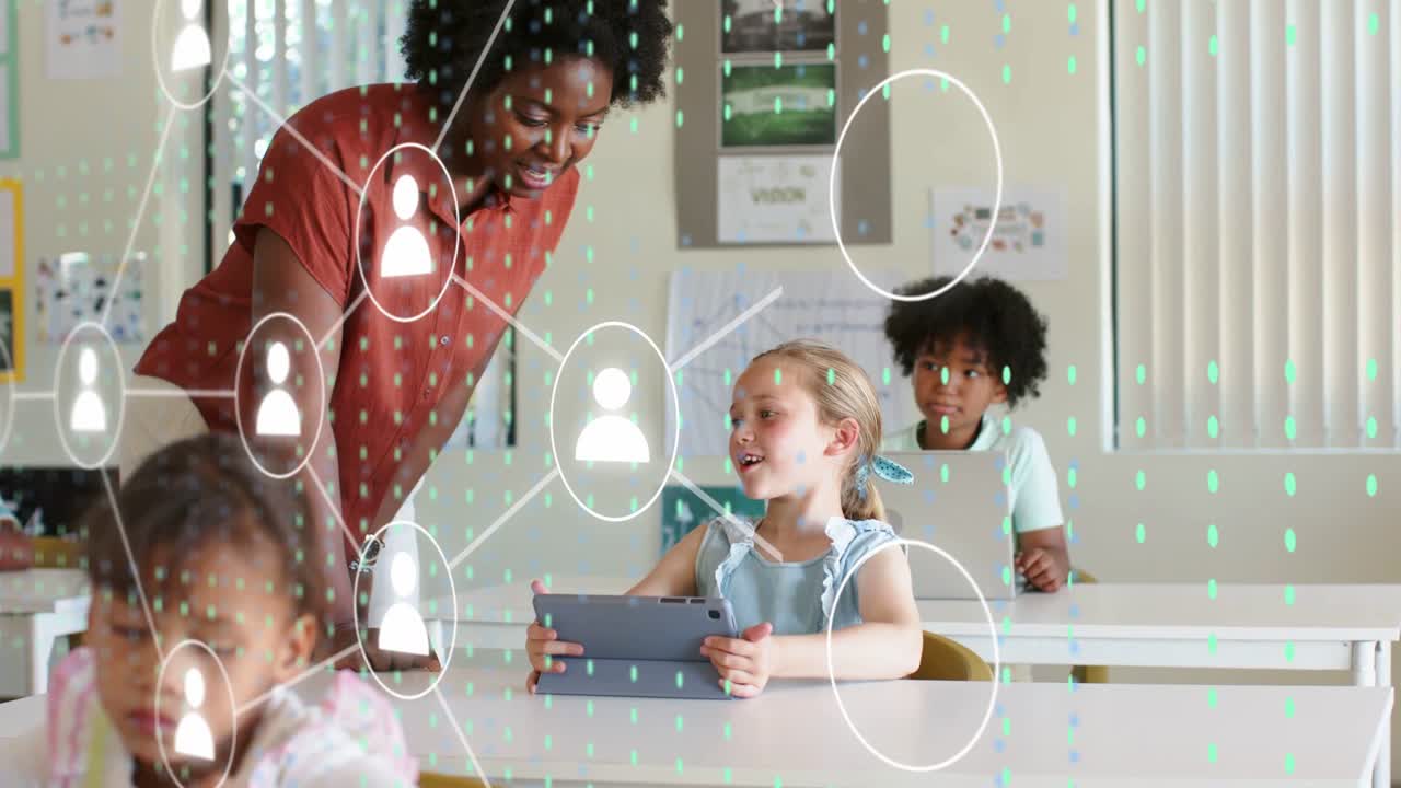 Child raising hand using tablet for help in classroom, teacher leaning, data growing around tablet