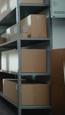 warehouse storage shelves with cardboard boxes