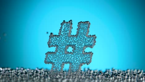 hash tag sign underwater in bubbles of oxygen on blue background hash tag sign underwater in bubbles of oxygen on blue background