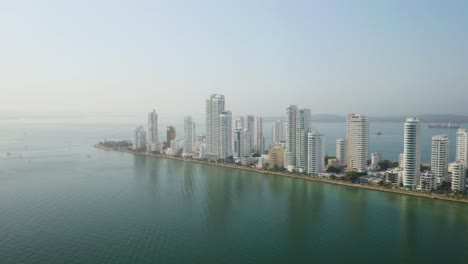 long establishing drone flight above cartagena, colombia on beautiful caribbean day