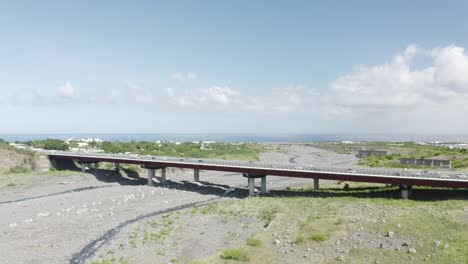 Aerial-view-of-a-bridge-on-Reunion-Island,-France-on-a-sunny-day