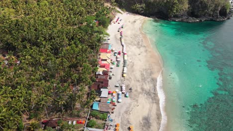 drone scene of beautiful virgin beach in east bali, karangasem, indonesia