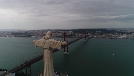 statue christ the king cristo rei lisbon almada at sunset aerial view