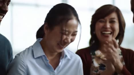 friends enjoy each other's company, sharing laughter and smiles in a warm indoor environment. the atmosphere radiates happiness and camaraderie as they bond.