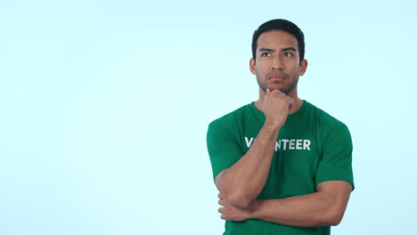 mockup, pointing and man volunteer in studio