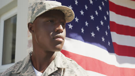 video of african american soldier standing outside house