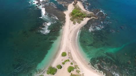 Aerial-Drone-4K-Flyover-Tropical-San-Juanillo-Sandy-Beach-Shore-With-Rocky-Coast-And-Blue-Ocean,-Costa-Rica