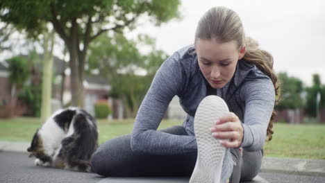 getting fit with her feline friend