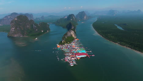 secluded floating village at ko panyi in phang nga national park, thailand. aerial wide shot