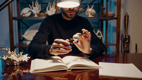 artisan working on a bead