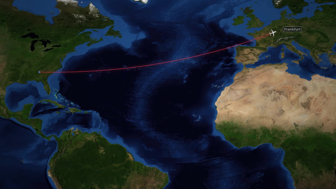 Airplane icon travels along red line from Atlanta to Frankfurt over satellite world map