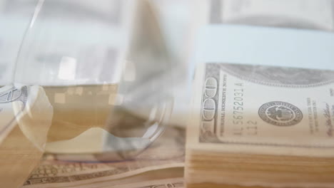 animation of lying banknotes over hourglass