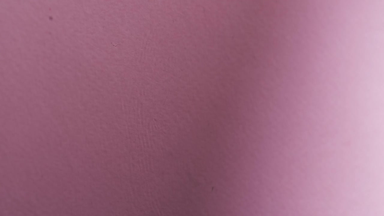 Video of close up of waves of water with copy space on pink background