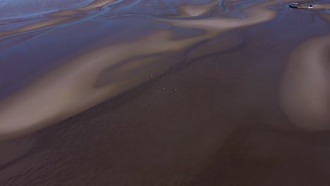 River-Patterns-in-Sandymount-Beach,-Dublin,-Ireland-during-a-Low-Tide