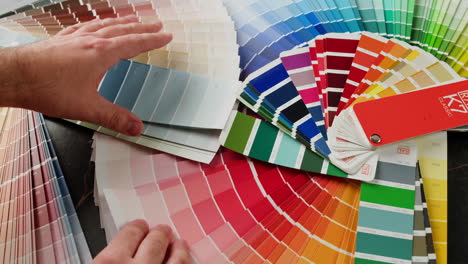 choosing paint colors from swatch