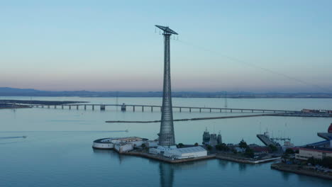 aerial - pylon of cadiz, castle and bridge, cadiz, spain, wide shot rising