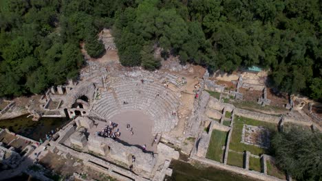 Ancient-Roman-Butrint-City-inside-Green-Park:-Amphitheater,-Stone-Walls,-Stairs,-and-Ruins-of-Buildings-at-This-UNESCO-Heritage-Site-in-Albania