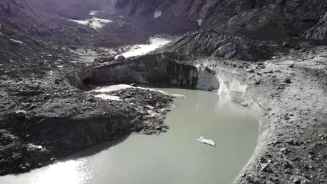 aerial flyover towards the end of the tiefen glacier in uri, switzerland