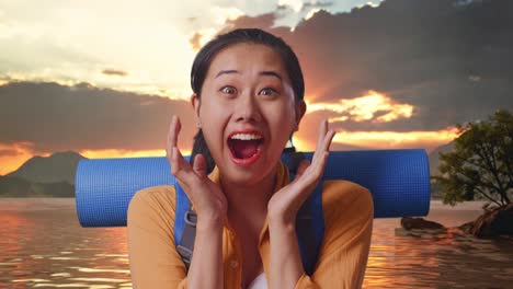 close up of asian female hiker with mountaineering backpack saying wow while standing at a lake during sunset time