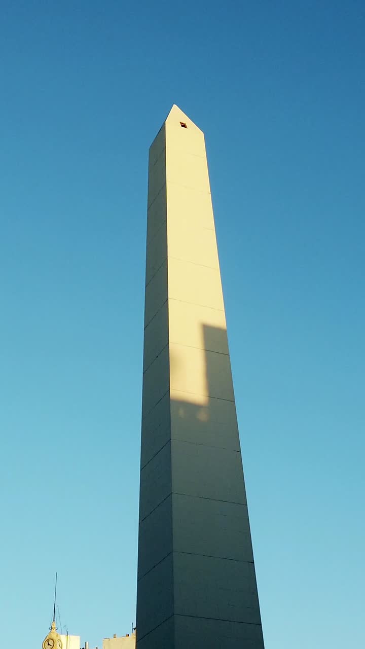 Obelisk Iconic tall monument of Buenos Aires City Argentina skyline with birds and heritage buildings, downtown