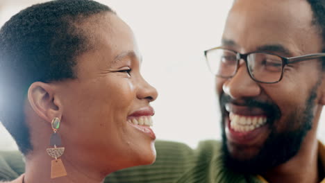 Happy,-laugh-and-African-couple-on-sofa