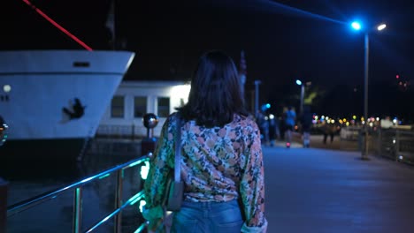 girl strolling on night