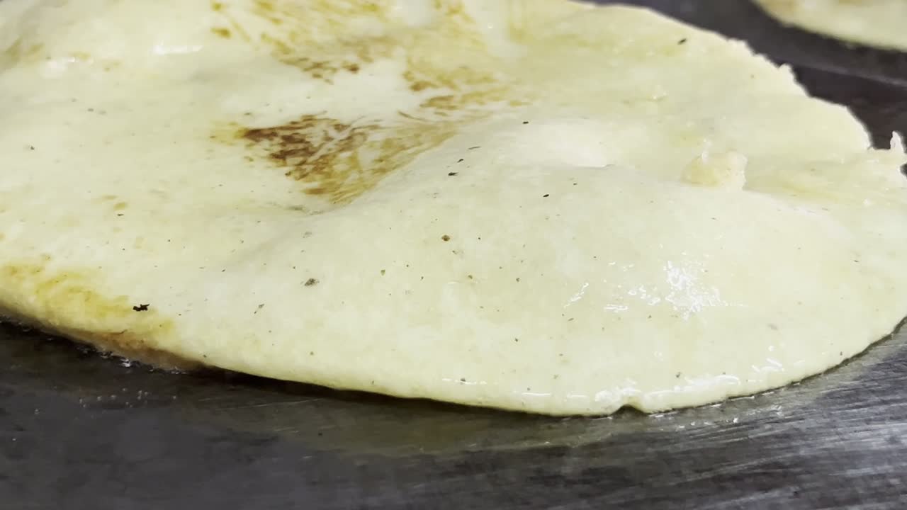 Cooking a Tortilla on a Hot Pan