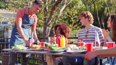 friends enjoying a barbecue outdoors