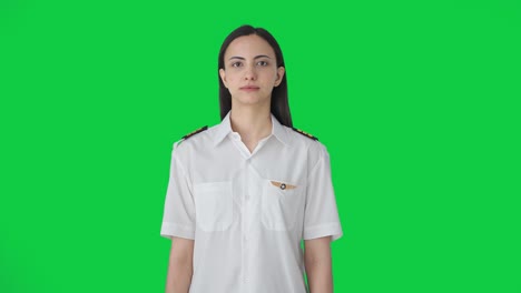 Indian-woman-pilot-looking-at-the-camera-Green-screen