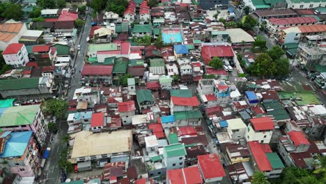 aerial view of densely packed neighborhood in manila, philippines on bright day