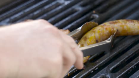 preparing fresh meat on a gas bbq grill