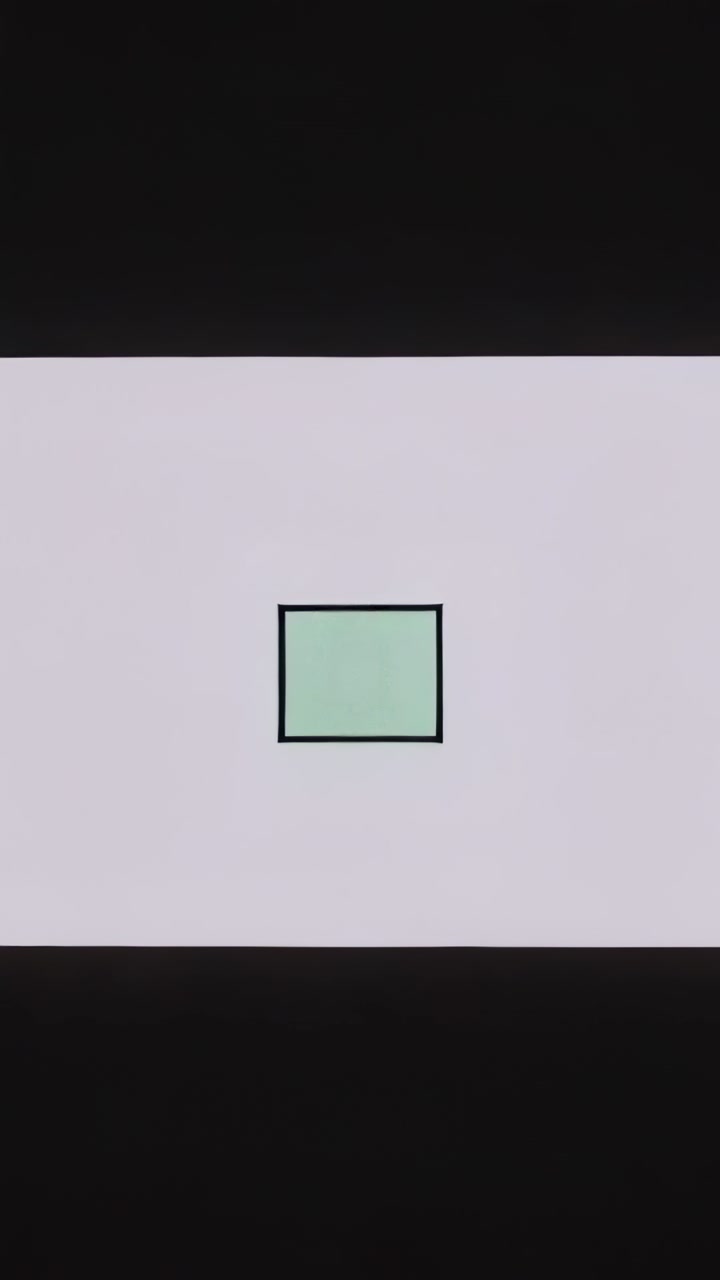 Vertical video: Playing center frame on monitor toggling square and revealing right panel with bars