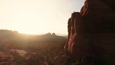 sedona, arizona aerial sunset along red rock cliffs