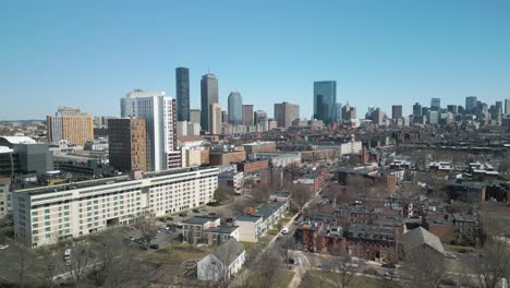 cinematic drone shot above boston, massachusetts on clear day