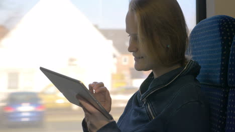 Comfortable-traveling-in-train-with-tablet-PC