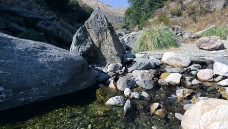 beautiful view of a mountain river with clear blue sky and vegetation, merlo, san luis, argentina