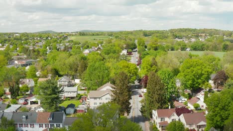 Aerial-reverse-dolly-reveals-small-town-in-America