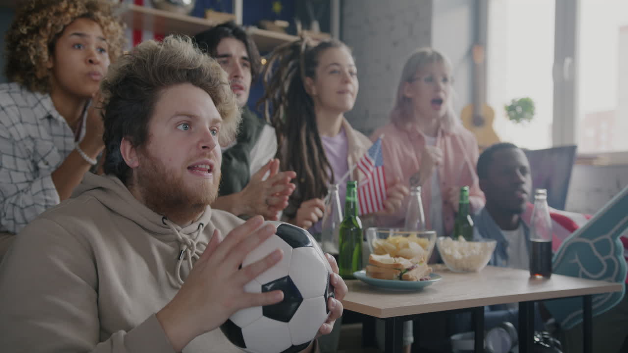 Friends Watching Soccer Match at Home