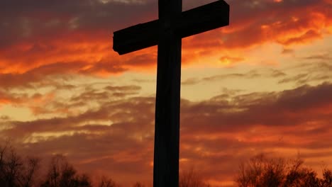 wooden cross at sunset