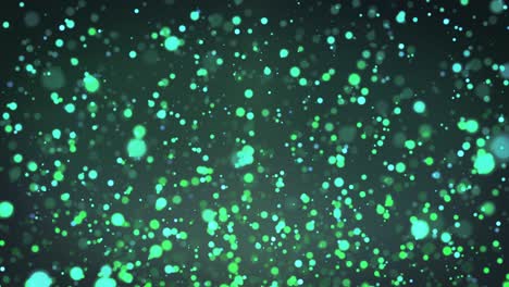 green particles background, dust particles with real lens flare.